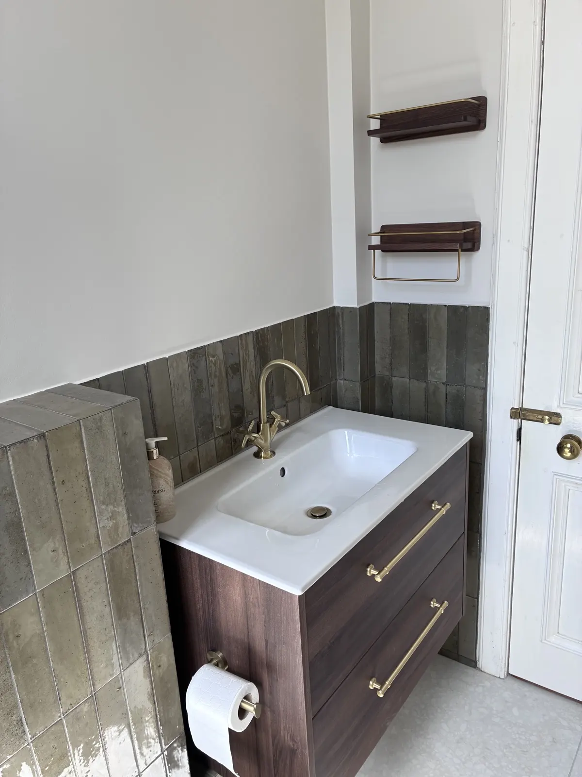 Dark tiled feature wall and vanity fitted by Scott-Eco Builders in Edinburgh