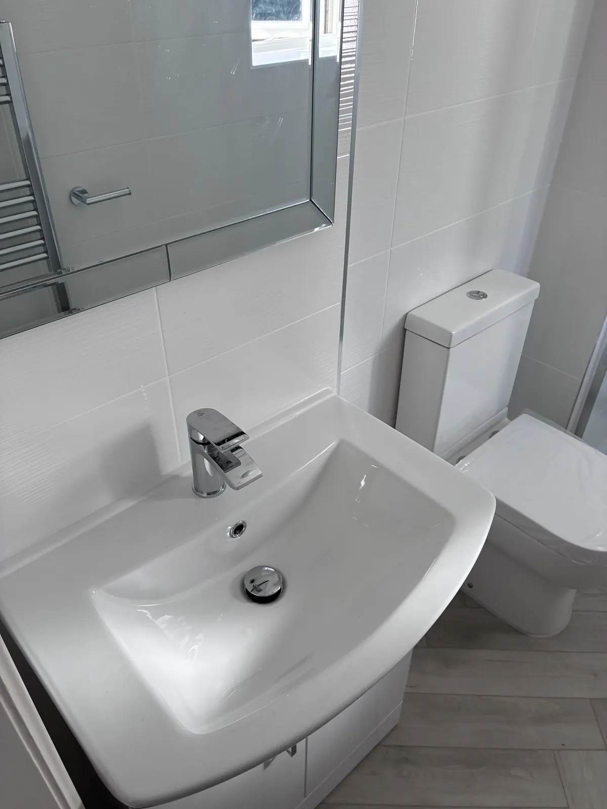 White bathroom renovation in East Lothian by Scott Eco-Builders - photo 2