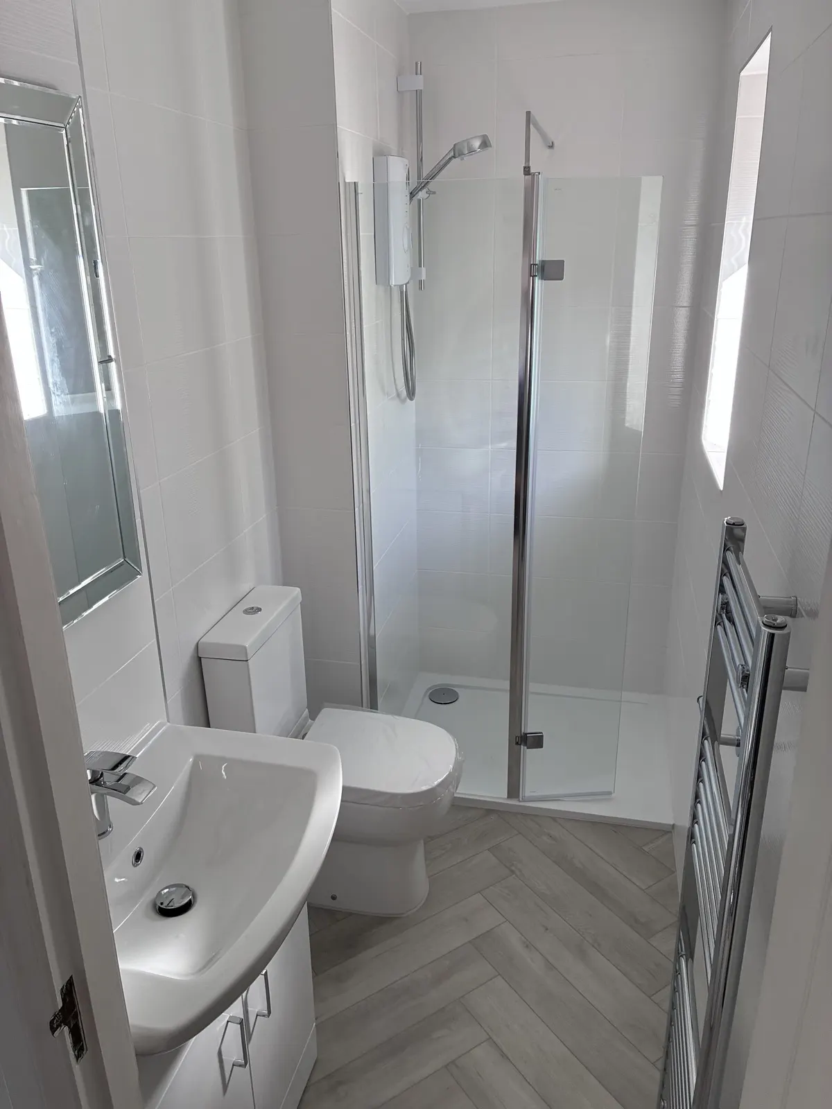 White bathroom renovation in East Lothian by Scott Eco-Builders - photo 6