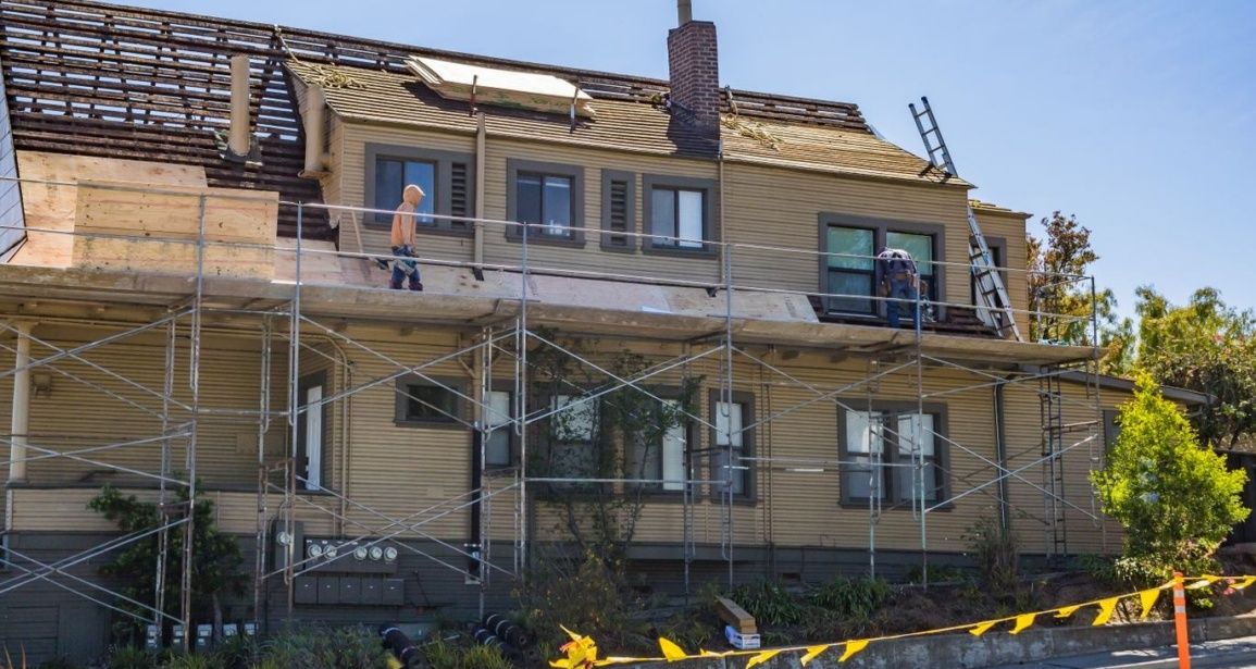 External work in progress on a house with scaffolding up, Edinburgh